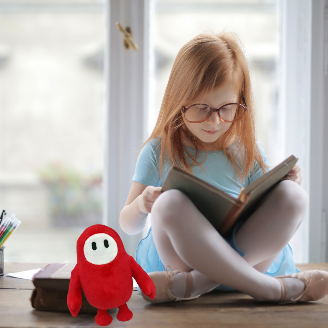 RED CAPSULE BIRD PLUSH TOY